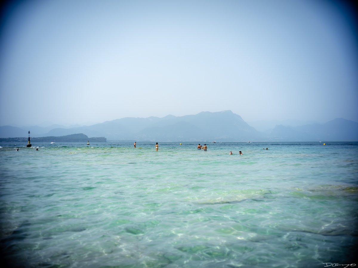 Photos from a trip through Italy in Summer of 2023. Locations include Rome, Florence, Tuscany, Castello di Bossi in Chianti, Siena, San Gimignano, Sirmione on Lake Garda, Bologna, Gudon, Italian Dolomites, Seceda, Cadini di Misurina, and Venice.